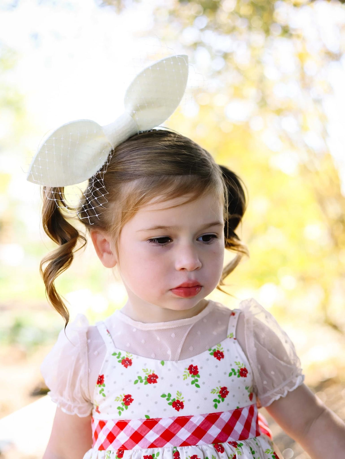 The Puff Girls Ivory Side Bow Fascinator